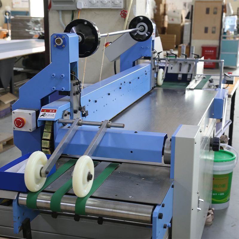 畫(hua)冊包背(bei)機